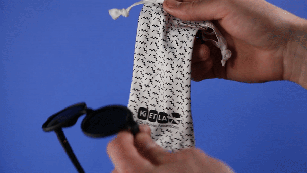 Using pouch to wipe lens
